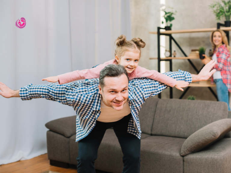 dad is playing with child and doing good parenting